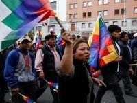 Bolivians protest self-declared “interim president” and police tear gas thousands of Evo Morales supporters