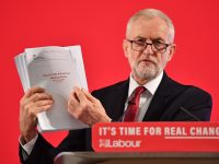 LONDON, ENGLAND - NOVEMBER 27:  Labour leader Jeremy Corbyn presents documents related to post-Brexit UK-US Trade talks as he speaks during an election policy announcement on the NHS at church house n Westminster on November 27, 2019 in London, England. The United Kingdom's will go to the polls in a general election on December 12. (Photo by Leon Neal/Getty Images)