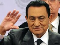 (FILES) A picture taken on December 25, 2010 shows Egyptian President Hosni Mubarak waving during the annual conference of the ruling National Democratic Party in Cairo. An Egyptian court on August 21, 2013 ordered the conditional release of Mubarak in one remaining case against him, judicial sources told AFP.    AFP PHOTO/STR-/AFP/Getty Images