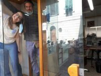 The owners of a shoe repair shop in Florence (*). In this picture, taken just after the end of the coronavirus lockdown, they are preparing to reopen their shop. They look happy, even euphoric. Time will tell if that optimism was justified.