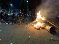 Barricades, fires and loot amid showdown with police in Seattle, 10 arrested