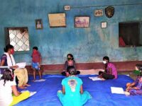 Dileswari teaching children in her village