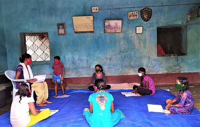 Dileswari teaching children in her village 1