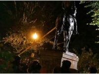 Demonstrators protesting white colonialism on a ‘Day of Rage’ march in downtown Portland, Oct. 11, 2020, pulled down this statue of President Theodore Roosevelt.