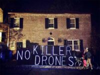 CODEPINK protests killer drones at DC home of Jeh Johnson Credit: CODEPINK
