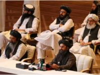 Taliban co-founder Mullah Abdul Ghani Baradar (R, bottom) at the peace talks with Afghan government, Doha, Qatar (File photo)