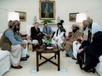 President Reagan meeting with Afghan Mujahideen in the White House to discuss Soviet invasion of Afghanistan