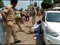 Police attack farmers in Moga