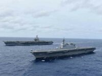 USS Reagan and Japanese ship (JS) Izumo jointly patrolling the South China Sea in June 2019.