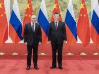 Chinese President Xi Jinping (right) held talks with visiting Russian President Vladimir Putin at the Diaoyutai State Guesthouse, Beijing, Feb. 4, 2022.