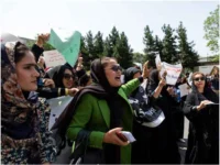 Protesting women chant "Bread, work and freedom" on August 13, 2022 in Kabul. Nava Jamshidi/Getty Images