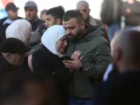 Palestinians mourn during a funeral for 10 people killed during an Israeli raid in the West Bank city of Nablus on 22 February. Nidal EshtayehXinhua News Agency
