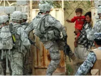 U.S. soldiers breaking into a home in Baquba, Iraq, in 2008   Photo: Reuters