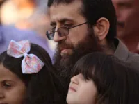 Khader Adnan celebrates with his children during a rally honoring him following his release from Israeli prison, near the West Bank city of Jenin on 12 July 2015. Adnan died Tuesday after 86 days of hunger strike against his renewed imprisonment. Shadi HatemAPA images