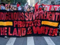 Participants hold an Indigenous sovereignty banner as hundreds of protesters disrupted traffic marching on Central Park West in New York City on Oct. 14, 2019. Activist group Decolonize This Place and a citywide coalition of grassroots groups organized the fourth Anti-Columbus Day tour.
PHOTO BY ERIK MCGREGOR / LIGHTROCKET / GETTY IMAGES