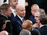 President Biden speaks to General Mark Milley after his 2023 State of the Union speech. Photo credit: Francis Chung/Politico