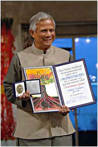 Muhammad Yunus with the Nobel Peace Prize