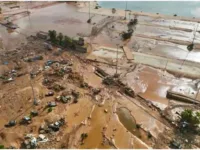 Whole neighborhoods in the coastal town of Derna ,Libya were washed away after torrential rains caused two dams to burst. (Jamal Alkomaty / Associated Press)