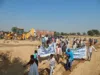 Villagers protesting against large-scale sand mining from the Ken river, near Kolawalpur.